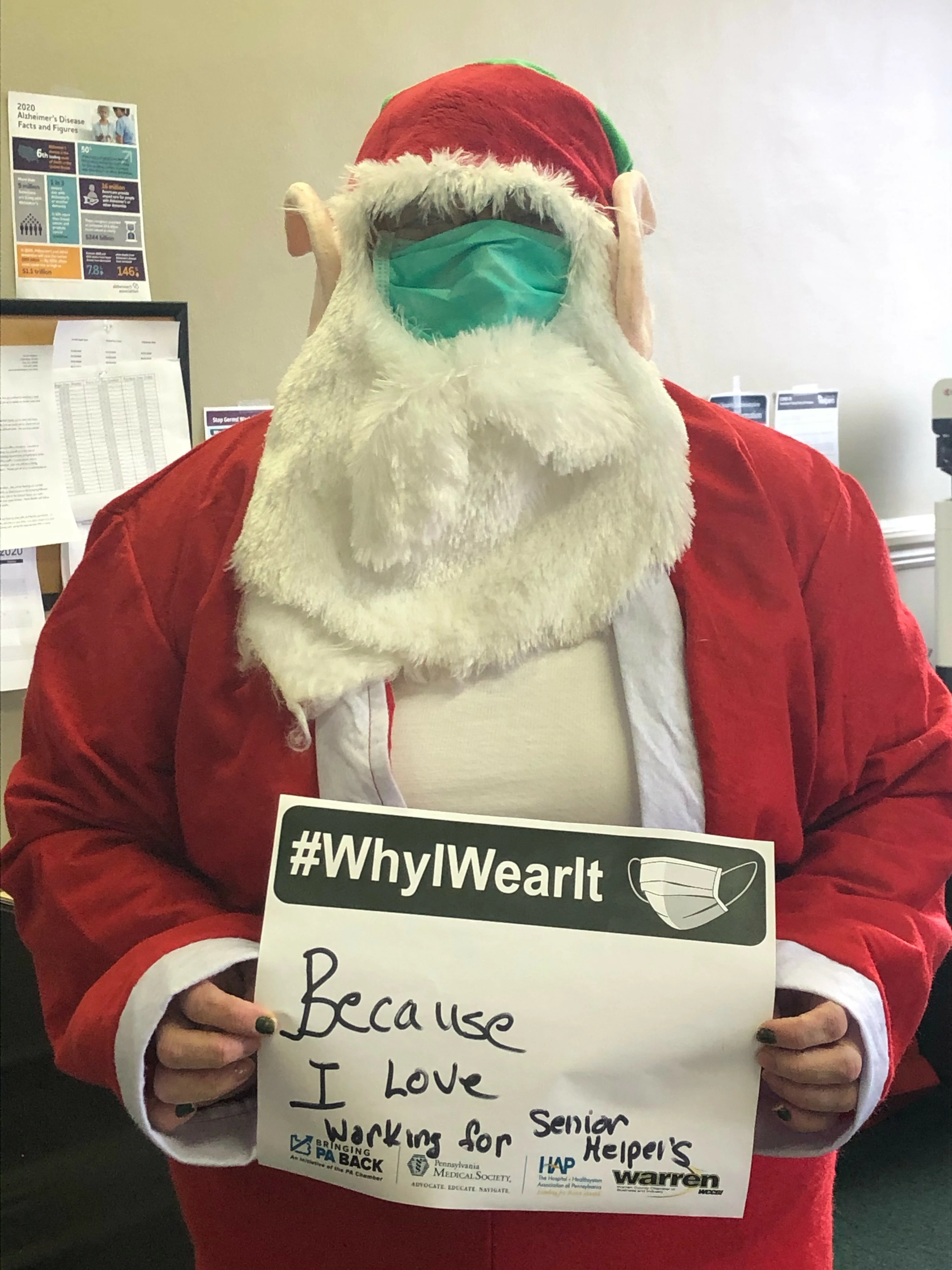 Nena spreading holiday cheer visiting clients dressed as Santa.