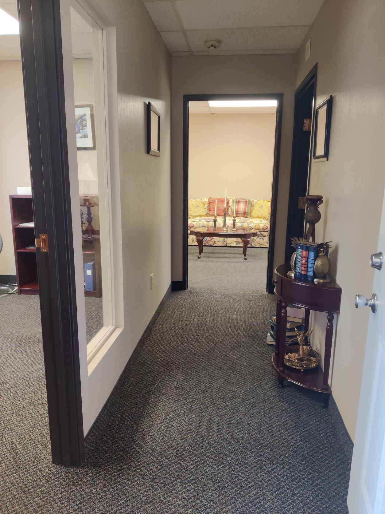 Visitors can view the living room straight ahead from the hallway.