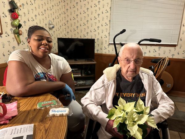 Client, Alexander, and caregiver, Lovia, enjoying their time together!