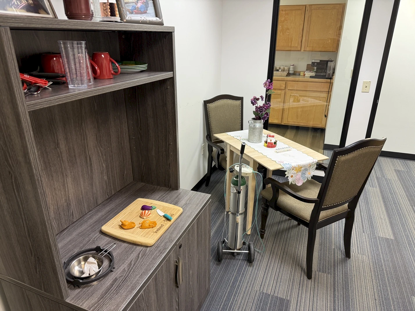 The Senior Helpers Portland West Center of Excellence kitchen simulation. Caregivers are taught how to safely help seniors with activities of daily living.