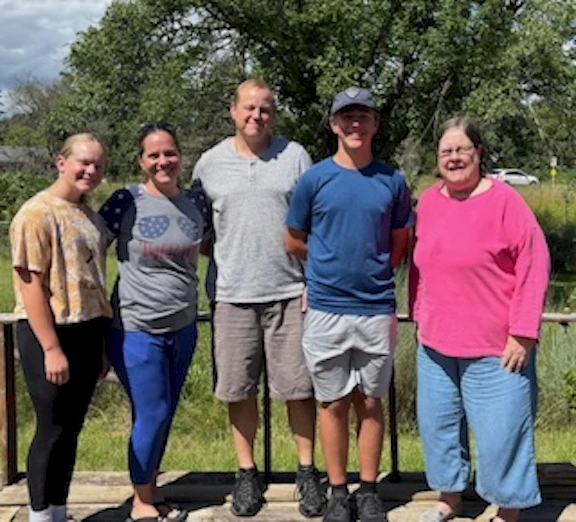 Neighbors watched in dismay as Barb fall through a rotten board on her deck and then they jumped into action. One family formed a crew to do a major repair of her entire deck!